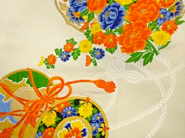  華文に花葉・鼓模様織出し袋帯